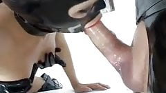 Rubber dom whips a maid